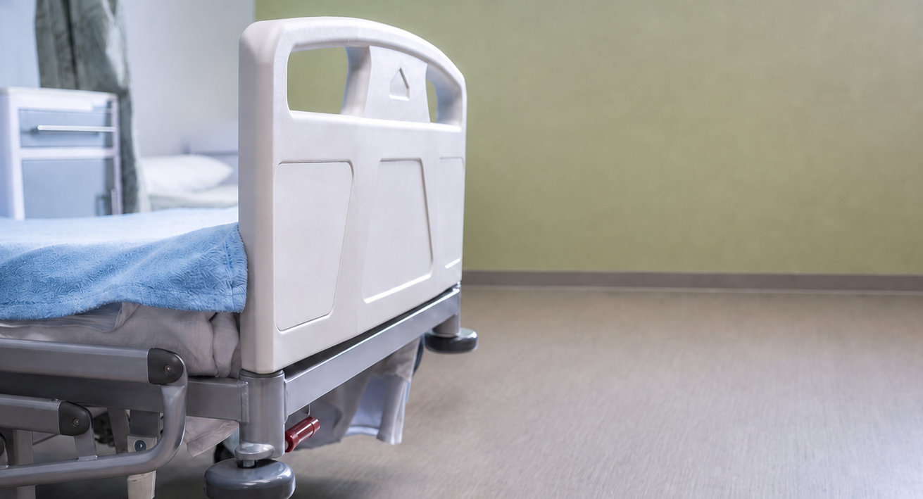 Close up image of an unoccupied hospital bed